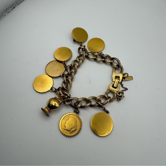 Vintage Monet Gold Tone Charm Bracelet with 9 Charms Easter Star Safety Chain - Picture 6 of 8